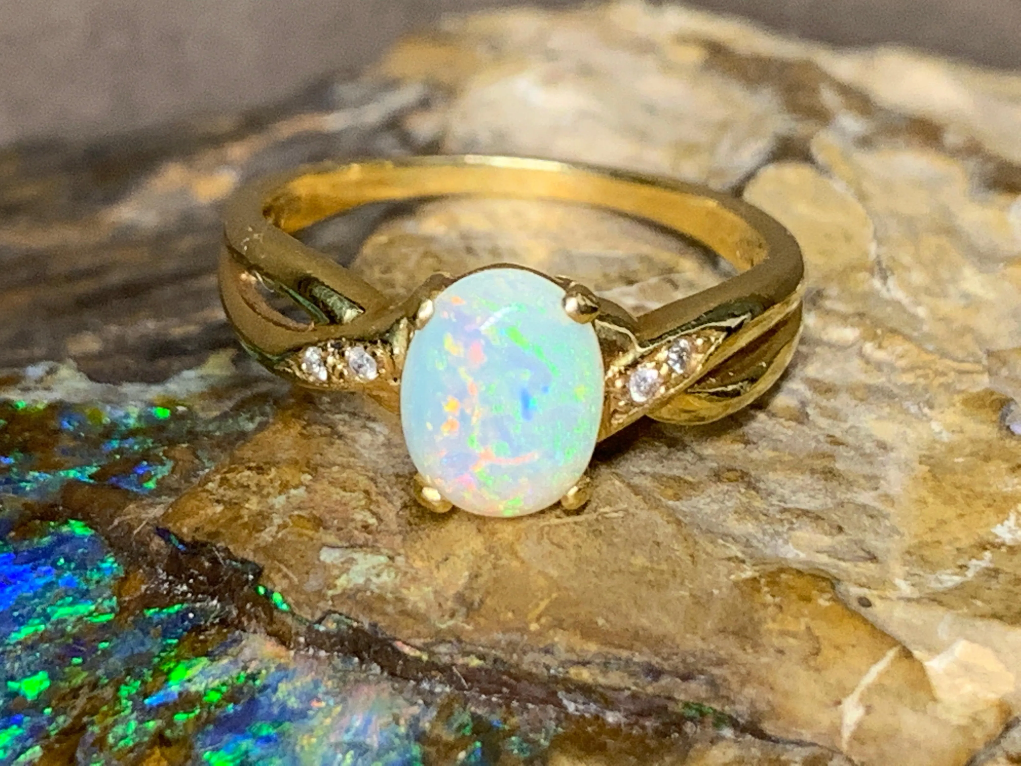 18kt Yellow Gold crossover Opal and Diamond ring