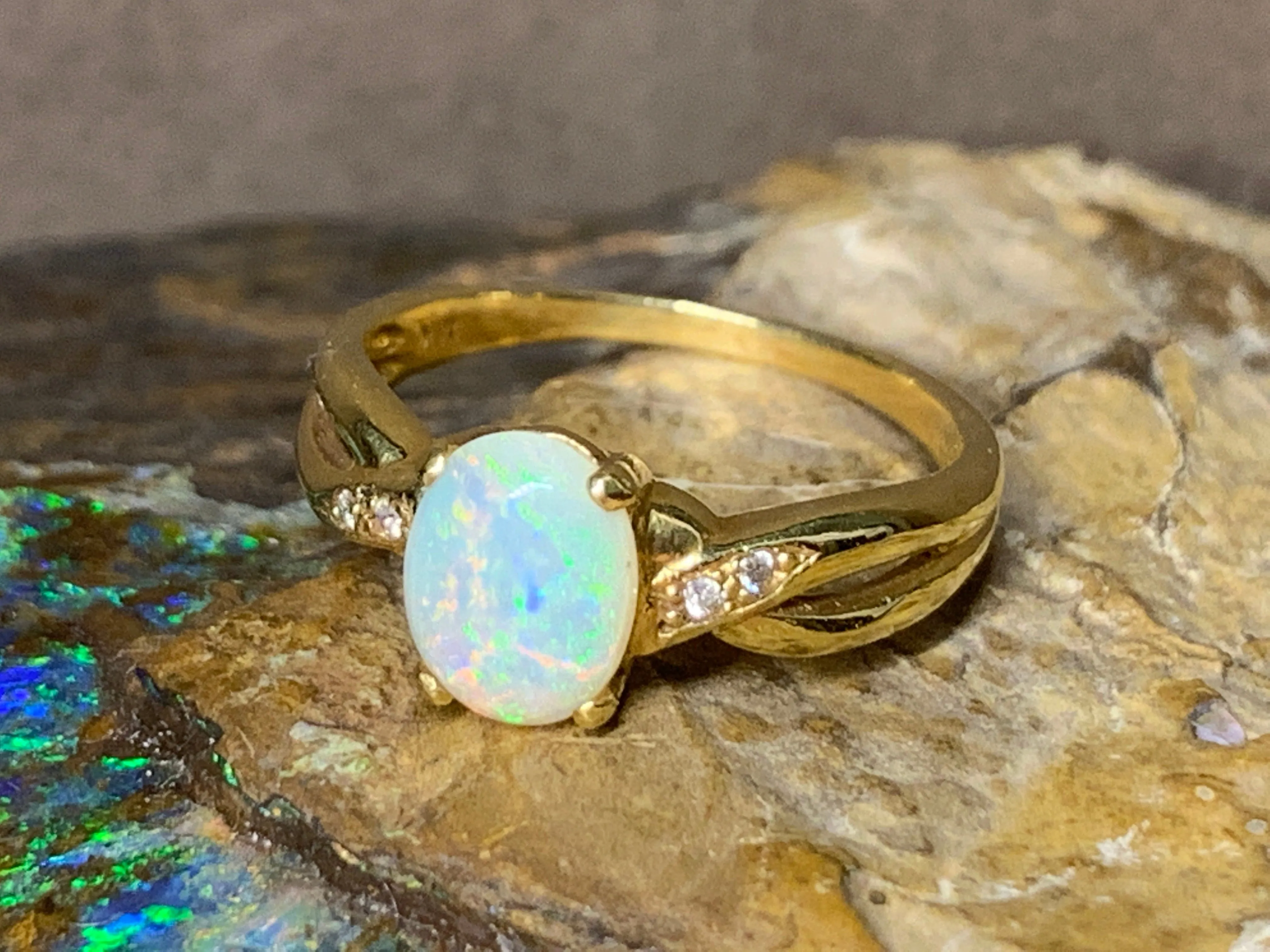 18kt Yellow Gold crossover Opal and Diamond ring