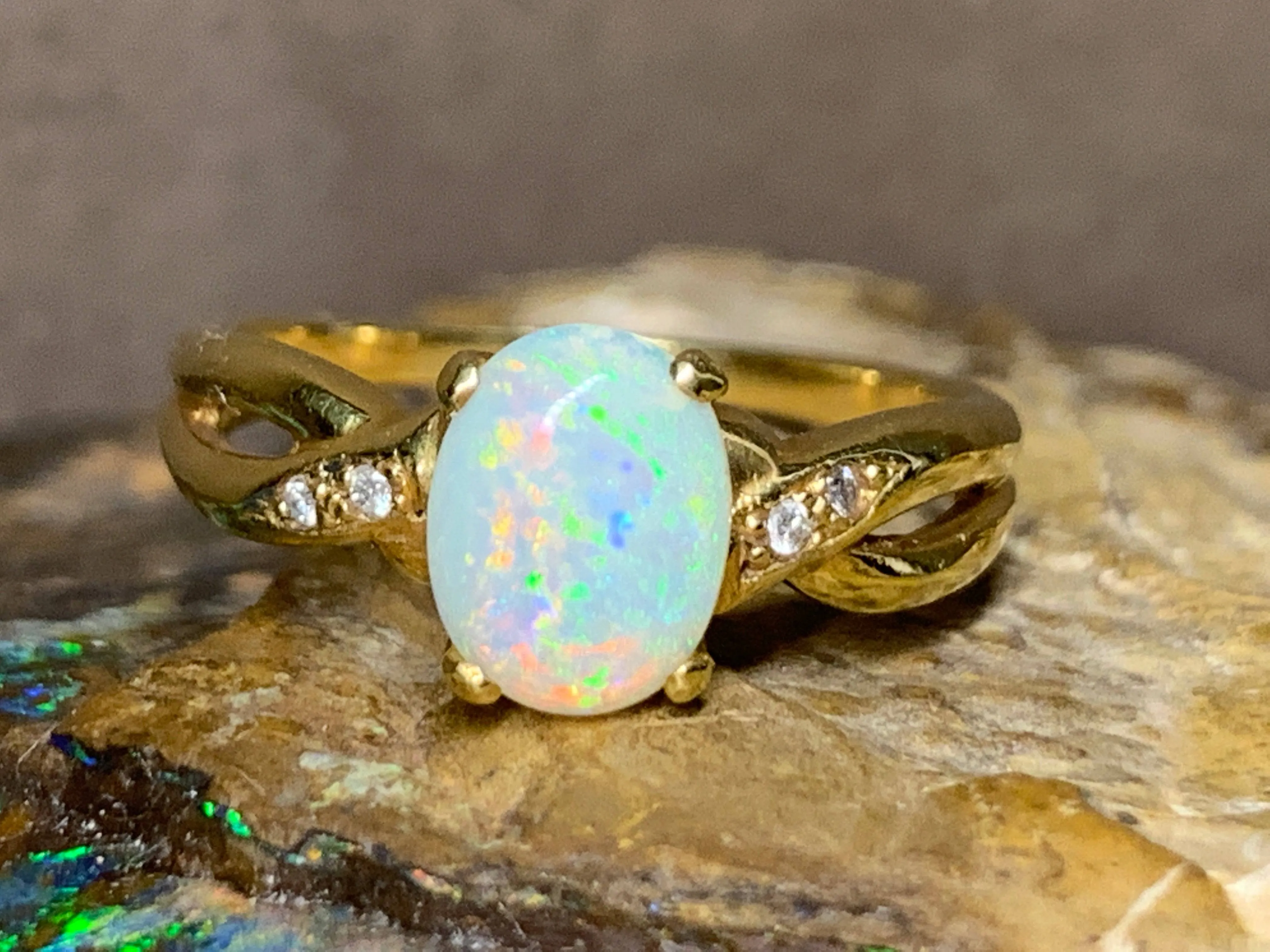 18kt Yellow Gold crossover Opal and Diamond ring