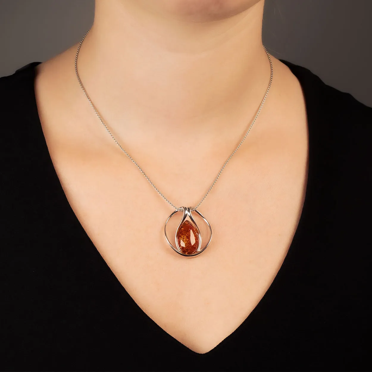 Amber Teardrop Folding Silver Pendant