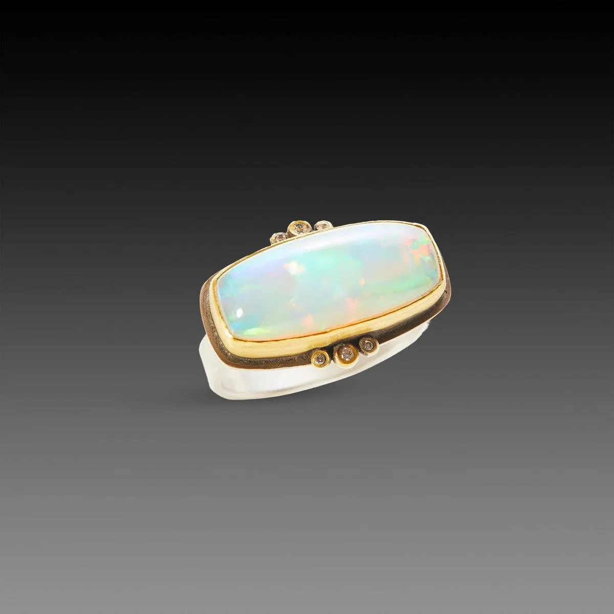 Ethiopian Opal Ring With Diamond Trios