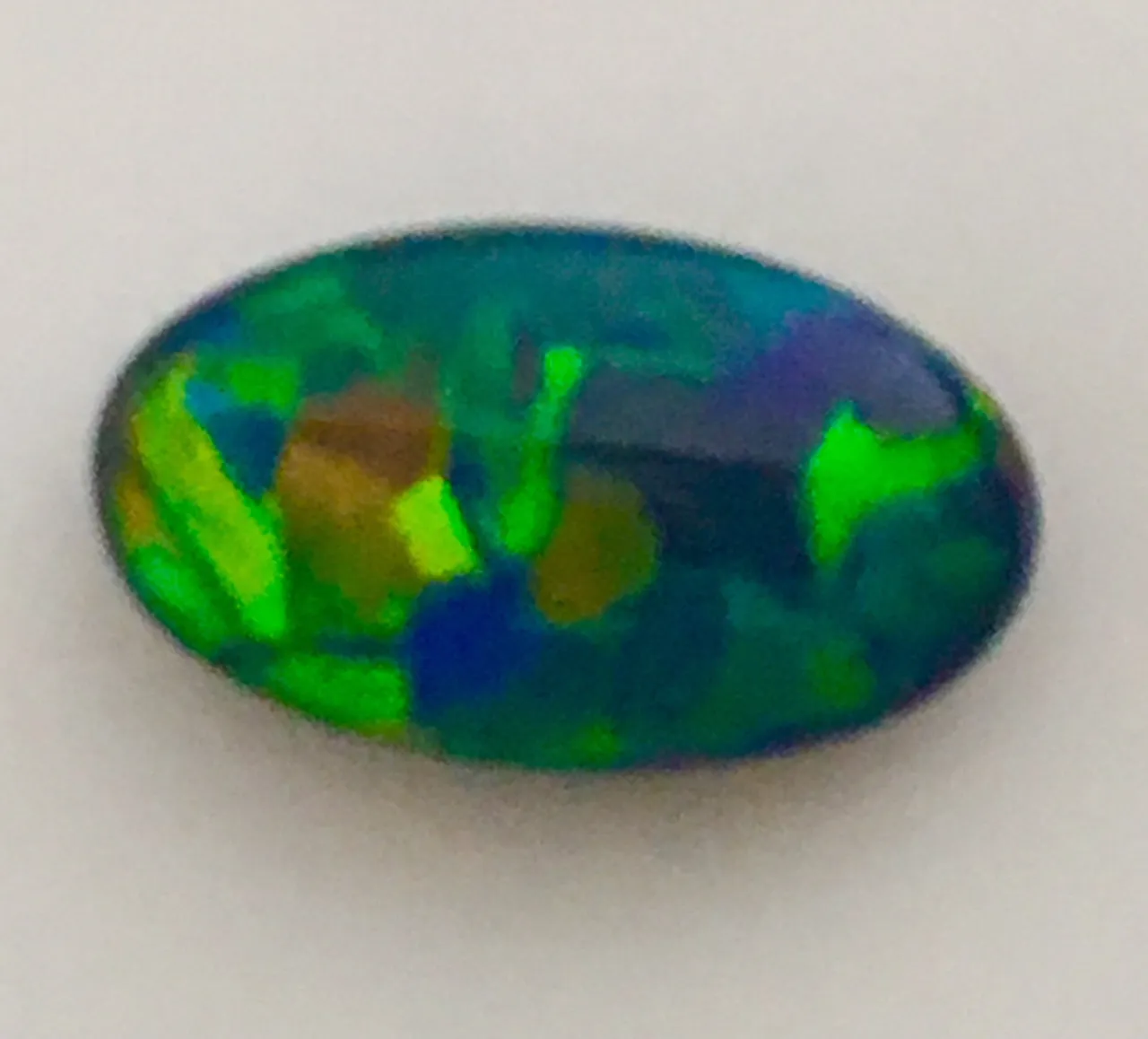 Gem Orange Gold Blue solid Black opal from Lightning Ridge