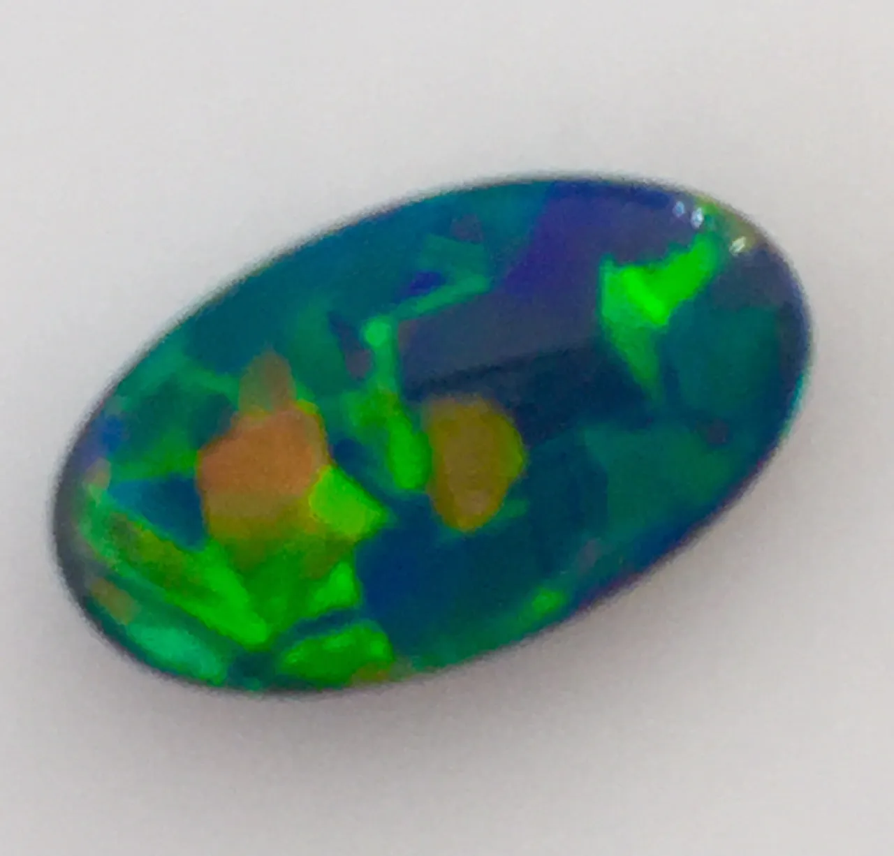 Gem Orange Gold Blue solid Black opal from Lightning Ridge