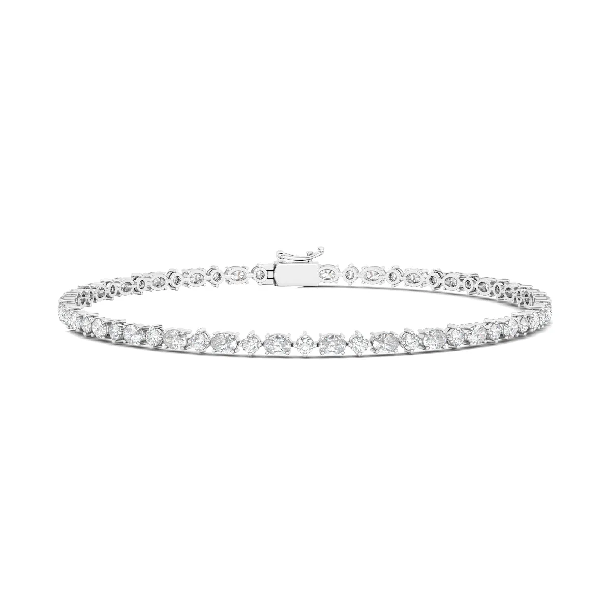 Oval Emerald And Round Diamond Tennis Bracelet